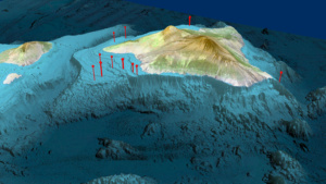 Location of IODP Expedition 389 boreholes. The bathymetric (ocean depth) data is derived from the Main Hawaiian Island Bathymetric Data Synthesis dataset developed by the Hawai'i Mapping Research Group (http://www.soest.hawaii.edu/HMRG/cms/). A color shaded relief image was produced from a 2010 version of the HMRG dataset and a land/ocean mask was used to integrate the Landsat imagery and bathymetry into a single image. Source data: Landsat 7 (ETM) satellite imagery. Originator: Earthstar Geographics LLC"